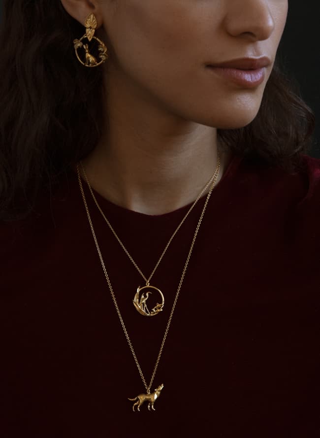 fables howling wolf hare heron necklace in gold plate worn by model