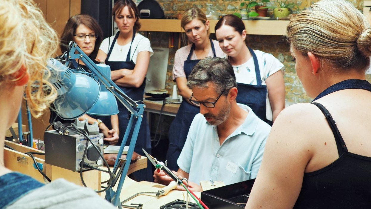 Alex Monroe teaching a jewellery school class at his london workshop