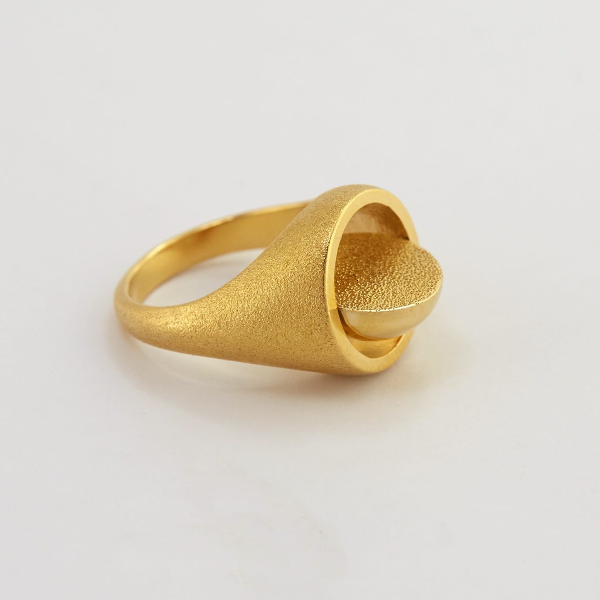 Paper shot Medi Spinning Dome Signet Ring by Alex Monroe Jewellery