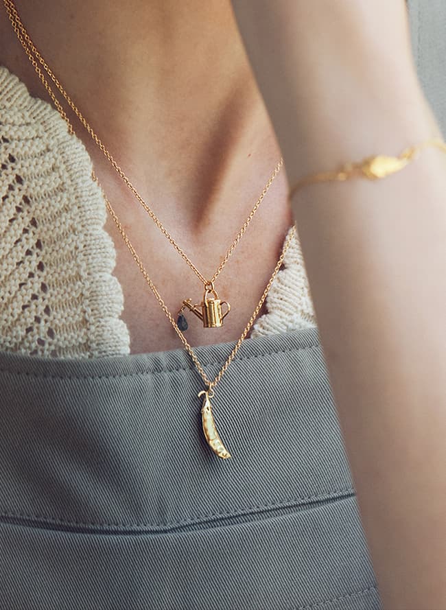 layered necklaces mixed metals silver and gold plate necklaces worn by model