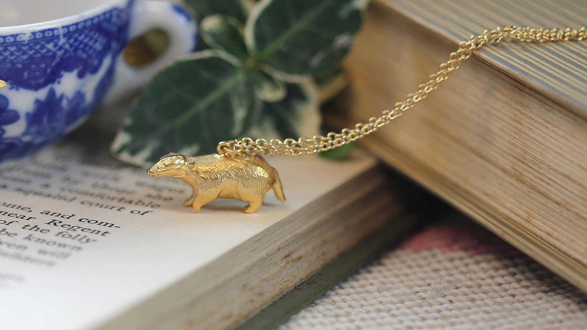 Rae Dunn polished bear necklace in yellow gold plated brass with cubic–  raedunnjewelry