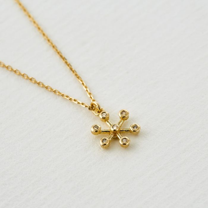 Snowflake pendant gold store