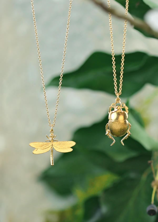 A gold plated dragonfly and a beetle necklace