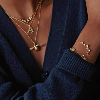 Dragonfly and Beetle gold plated necklaces.