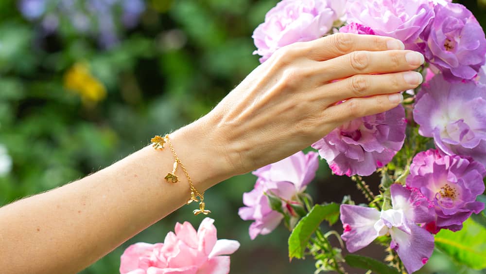 In-line bracelets displayed on festive baubles.