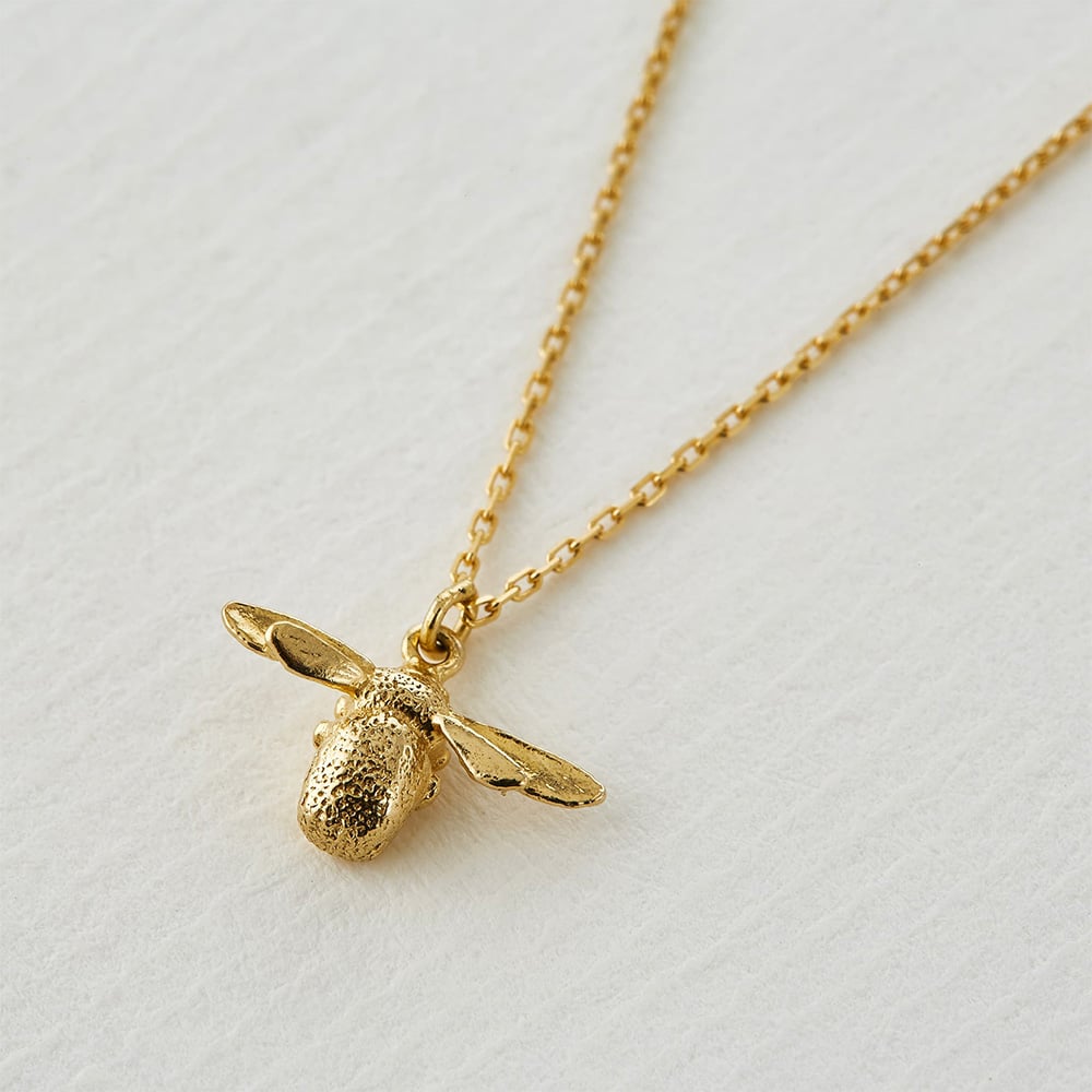 paper shot of Teeny Tiny Bumblebee Necklace by Alex Monroe Jewellery