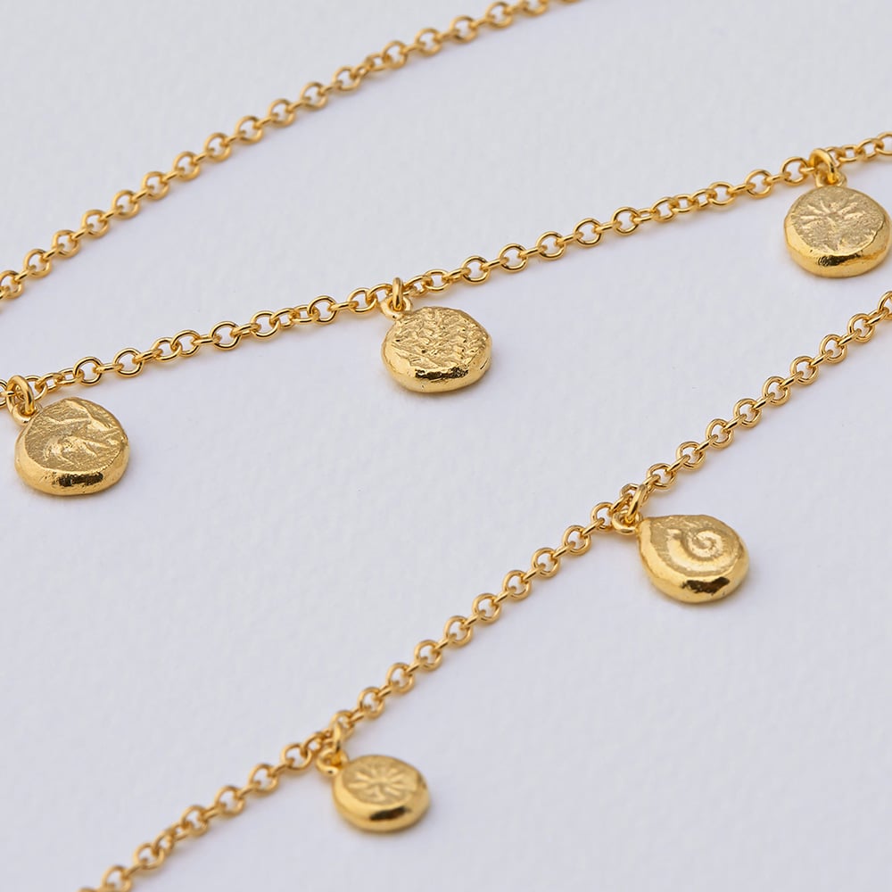 paper shot of gold plated Paleontology Nugget Necklace by Alex Monroe Jewellery