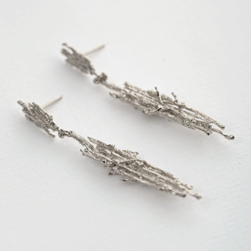 Paper shot of Nest Structure Statement Drop Earrings by Alex Monroe Jewellery