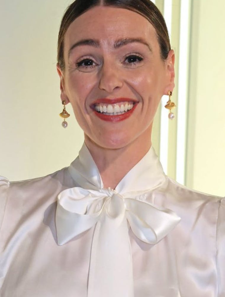 Suranne Jones wearing Alex Monroe's Banquet | Fruit Basket Earrings with Rhodolite Garnet & Freshwater Pearl