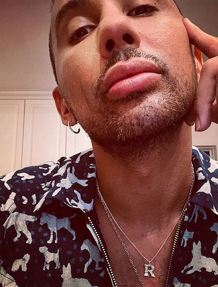 Bianca Del Rio wearing silver Floral R necklace Alex Monroe Jewellery