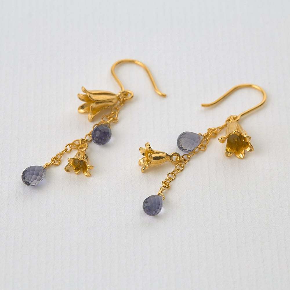 Paper shot of gold plated Bluebell Drop Earrings by Alex Monroe Jewellery