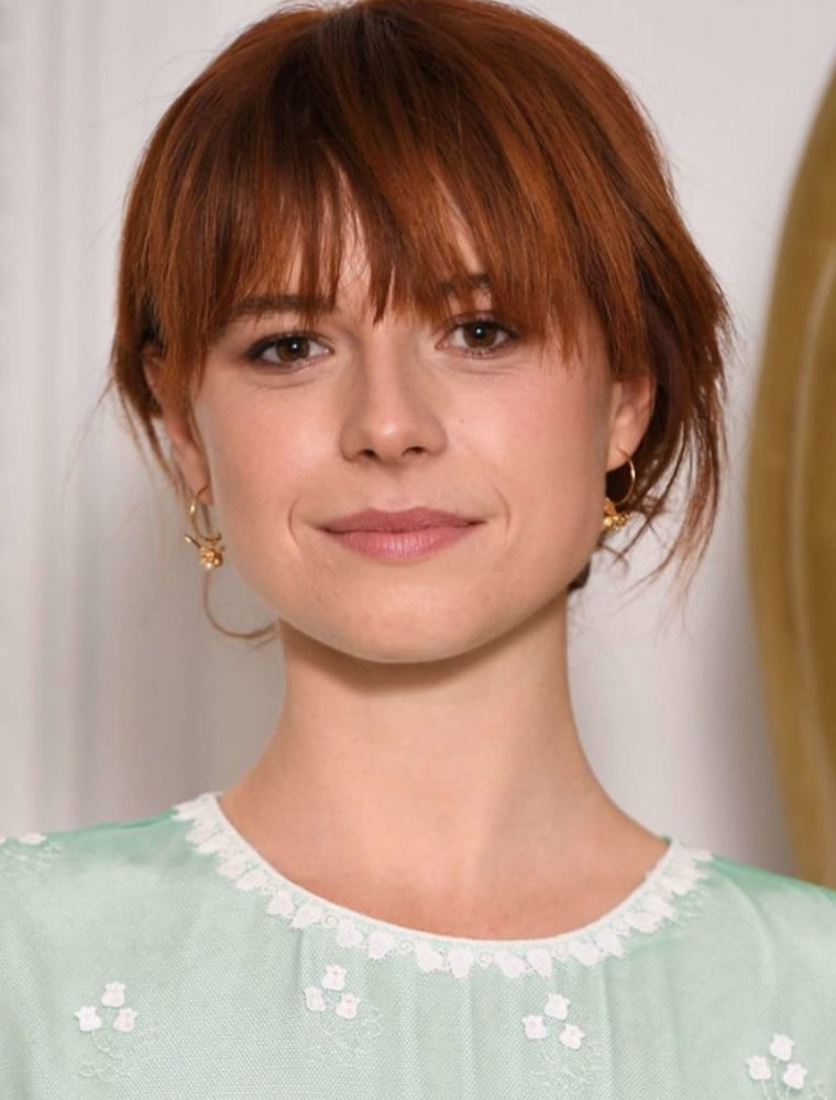 Jessie Buckley wearing gold plated Flying Bee with Pearl Hoop Earrings