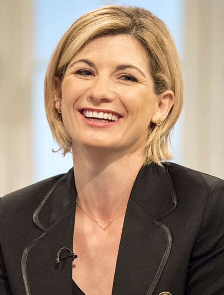 Jodie Whittaker wears solid yellow gold Plume Flare Necklace by Alex Monroe Fine Jewellery