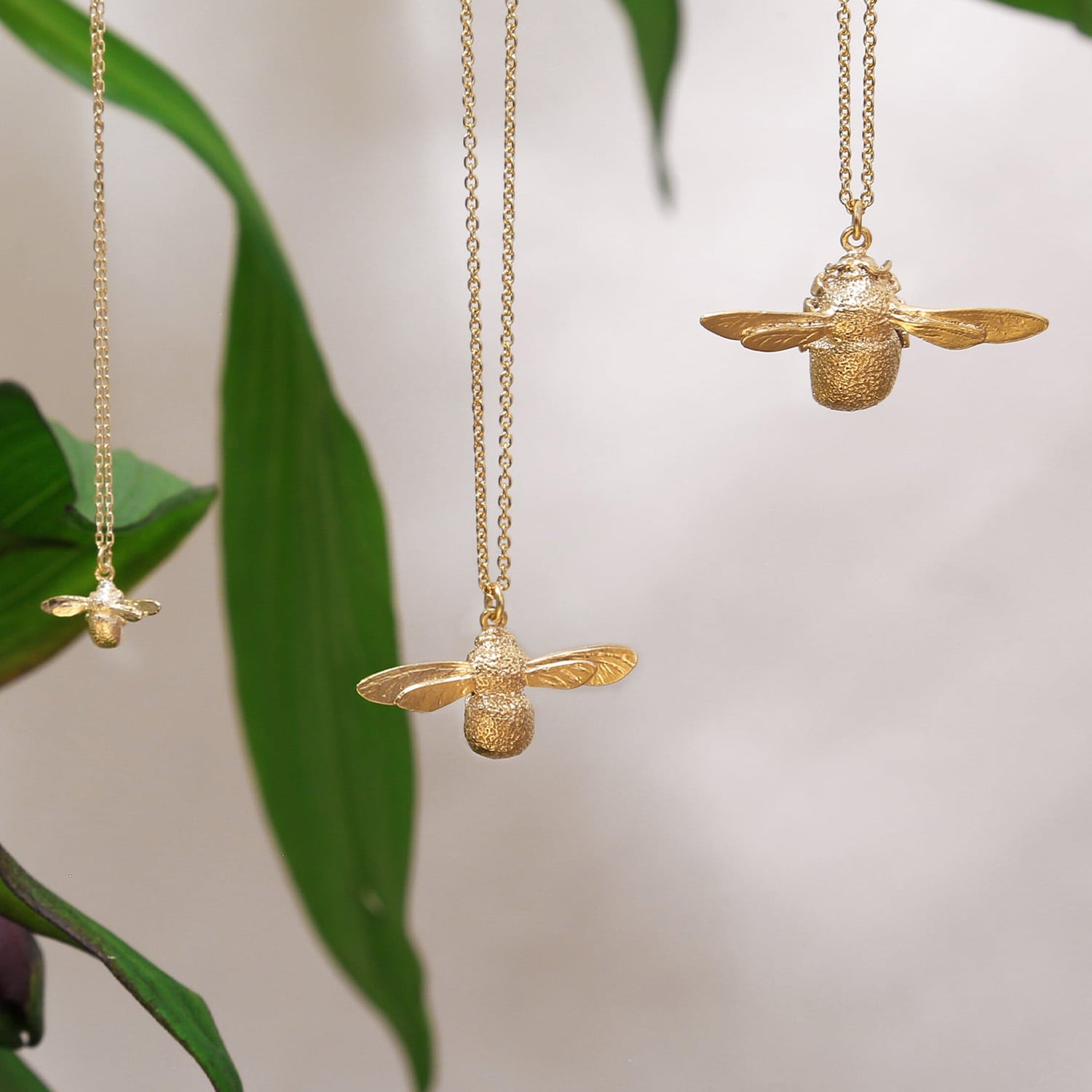 Alex Monroe's Iconic bumblebee , baby and teeny tiny necklaces in gold