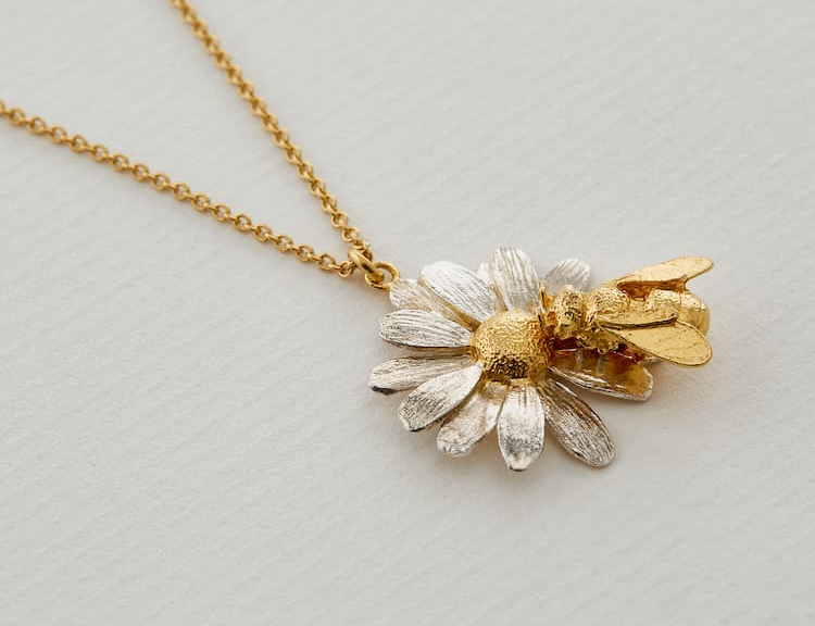 gold plated honeybee on silver daisy necklace in collaboration with British Bee Keepers Association