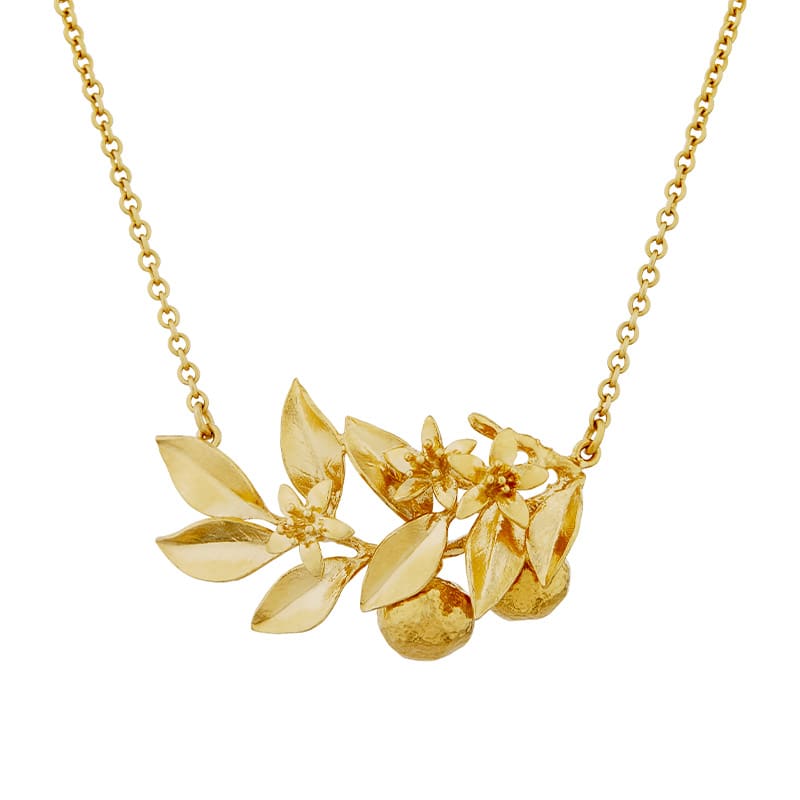 Product shot of gold plated Orange Blossom Branch Necklace with Hanging Oranges by Alex Monroe Jewellery