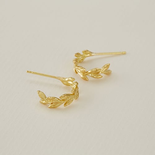 paper shot of solid yellow gold Harvest Wheat Huggie Hoop Earrings by Alex Monroe Jewellery