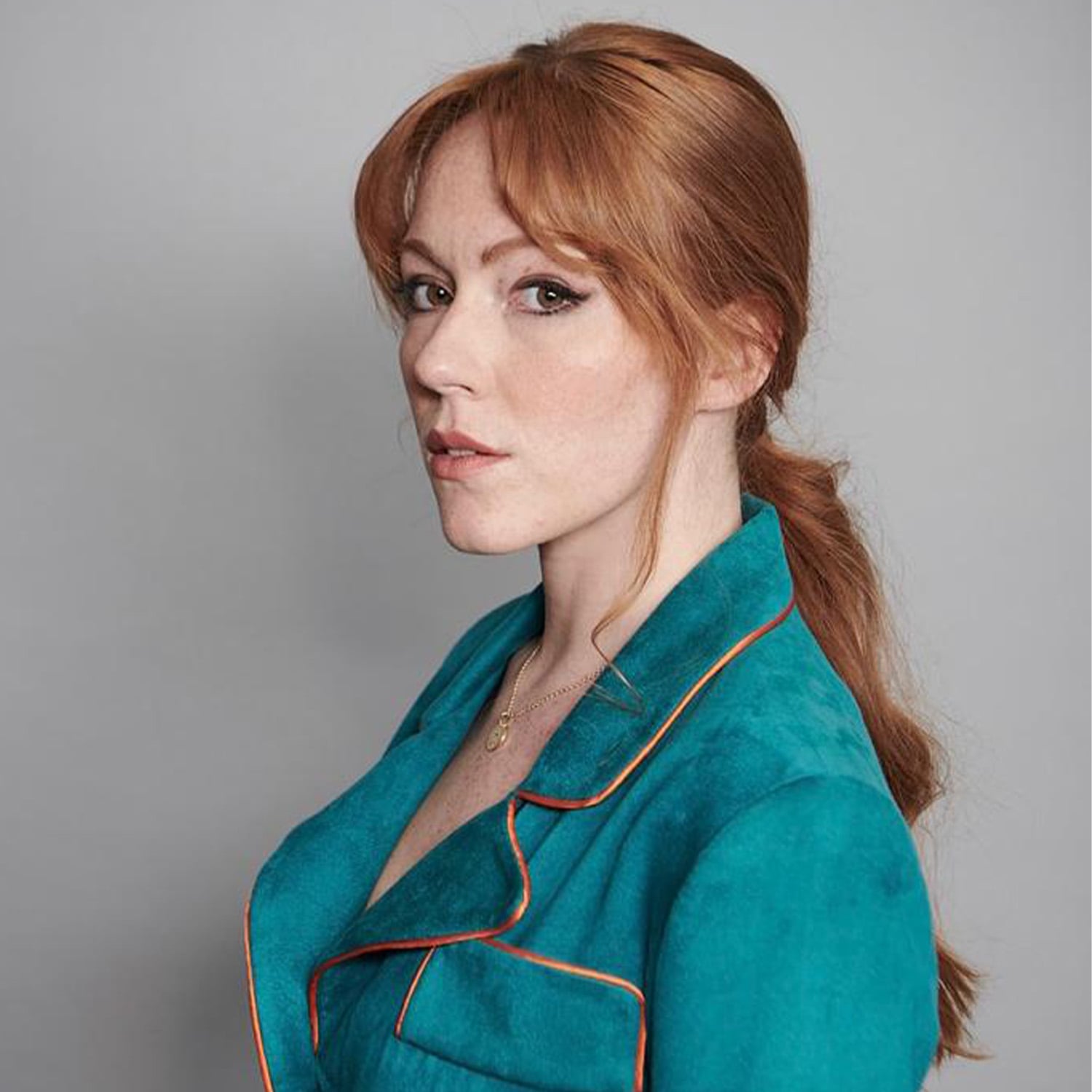 Profile photo of Charlotte Spencer wearing a blue jacket for Alex Monroe's Podcast