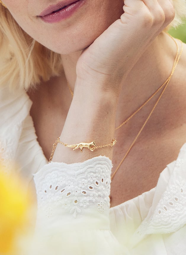 gold plated fox bracelet worn by model