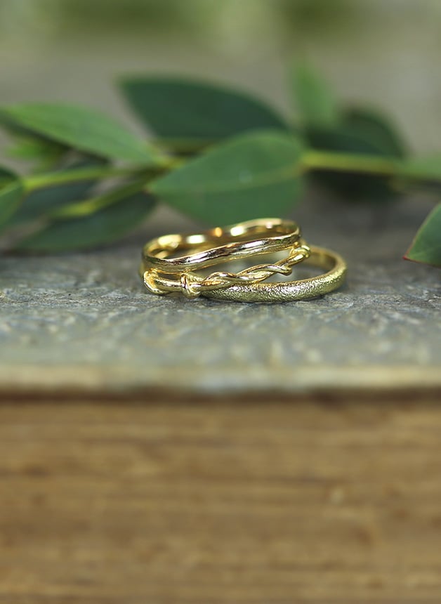 3 classic textured yellow gold wedding bands by Alex Monroe