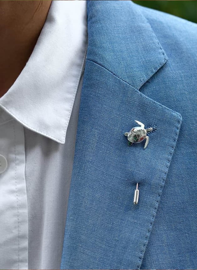 alex monroe solid silver turtle pin on blue jacket 