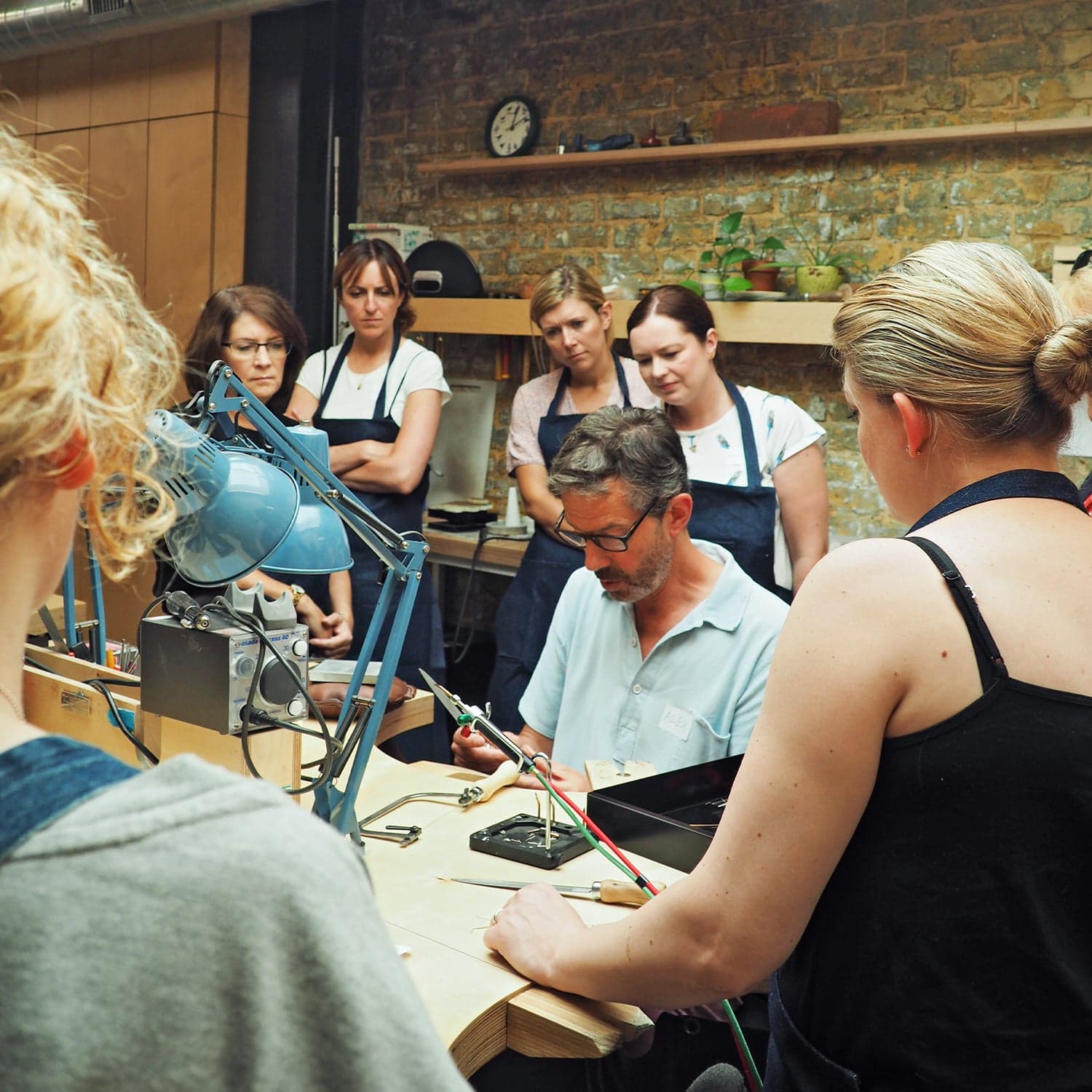 Alex Monroe teaching jewellery making at his London workshop