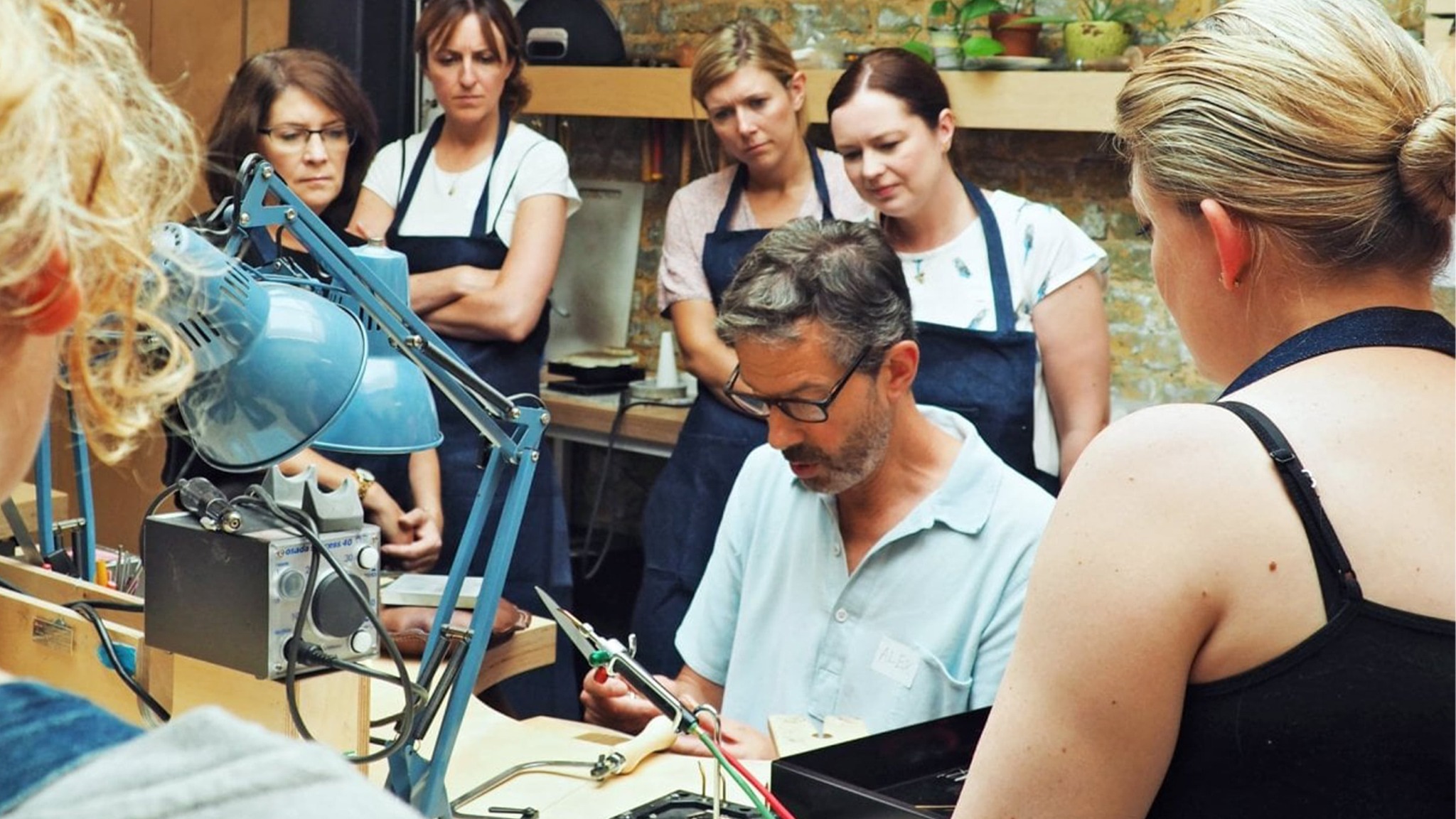 Alex Monroe teaching a class at Jewellery School in his Tower Bridge workshop