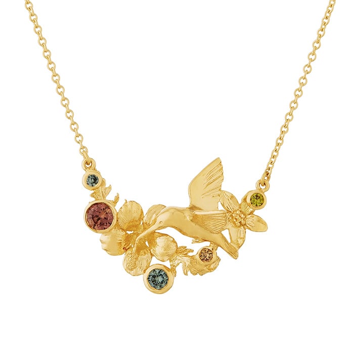 Product shot of yellow solid gold Hummingbird, Flower & Leaf Inline Necklace with Tropical Mix Sapphires