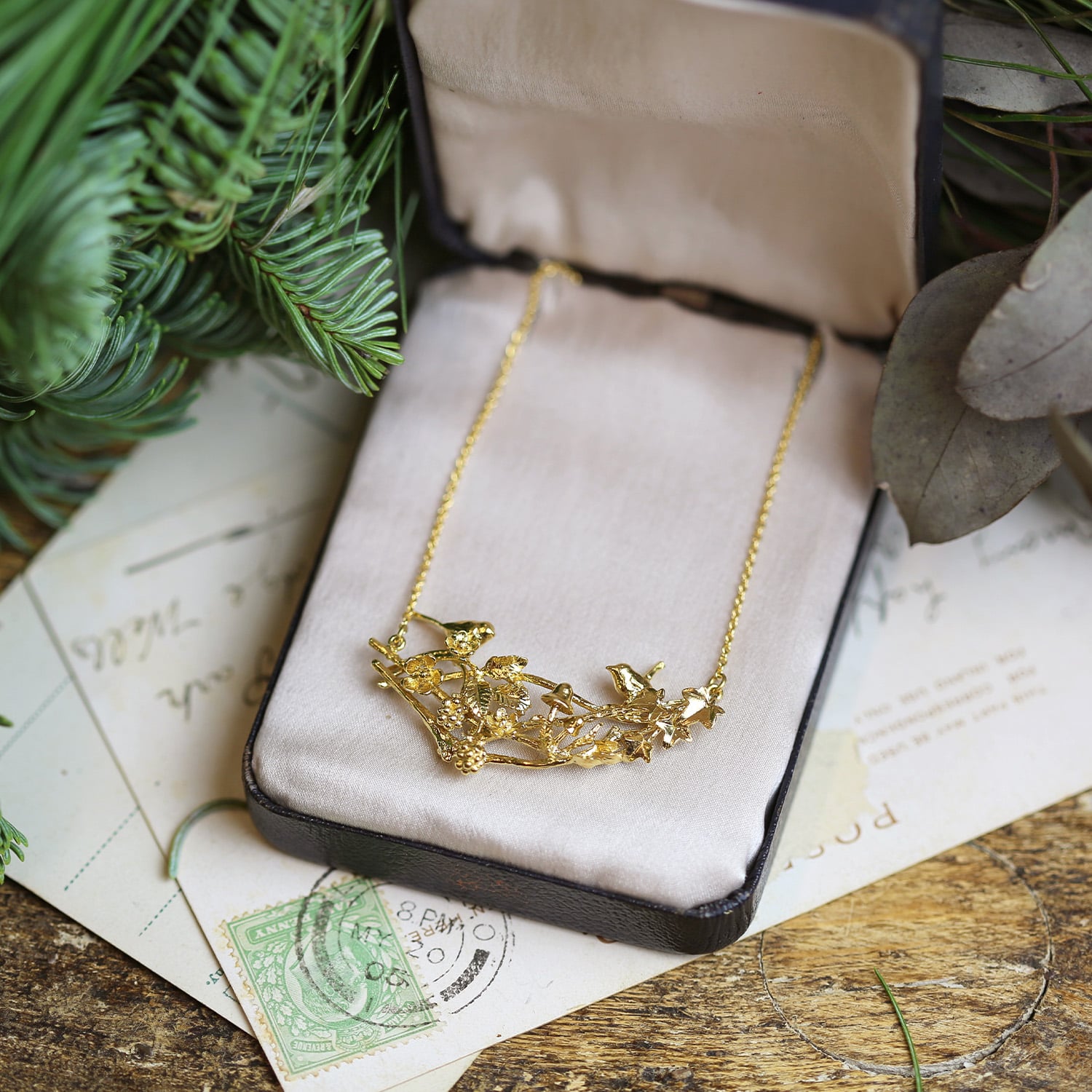 Winter Woodland Treetop In-Line Necklace in gold plate inside a vinatge jewellwey box