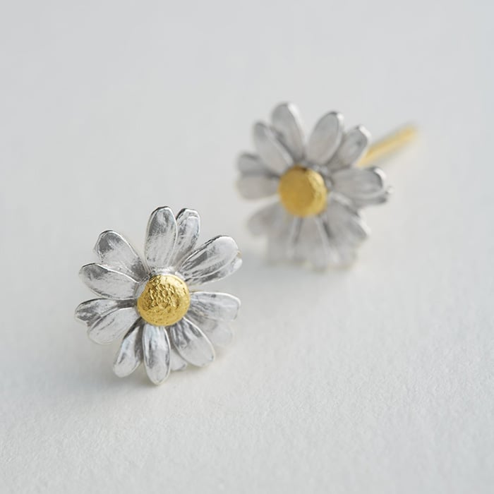 Paper shot of a Little Daisy Stud Earrings by Alex Monroe Jewellery