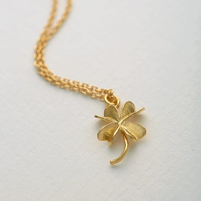 Paper shot of a Lucky Clover Necklace by Alex Monroe Jewellery