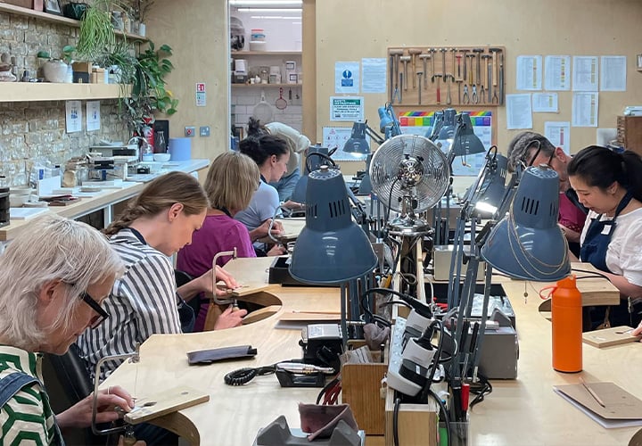 Students working in Alex Monroe's Workshop