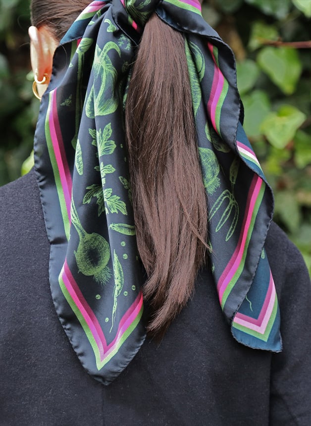 Model wearing Alex Monroe's new Potager scarf