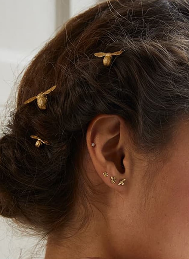 Model wearing gold plated Set of 3 Mixed Size Bee Hair Pins by Alex Monroe Jewellery