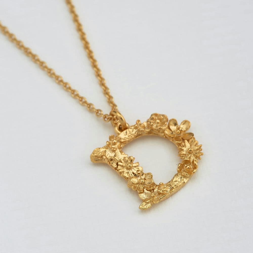 Paper shot of Alex Monroe Floral Letter D Necklace