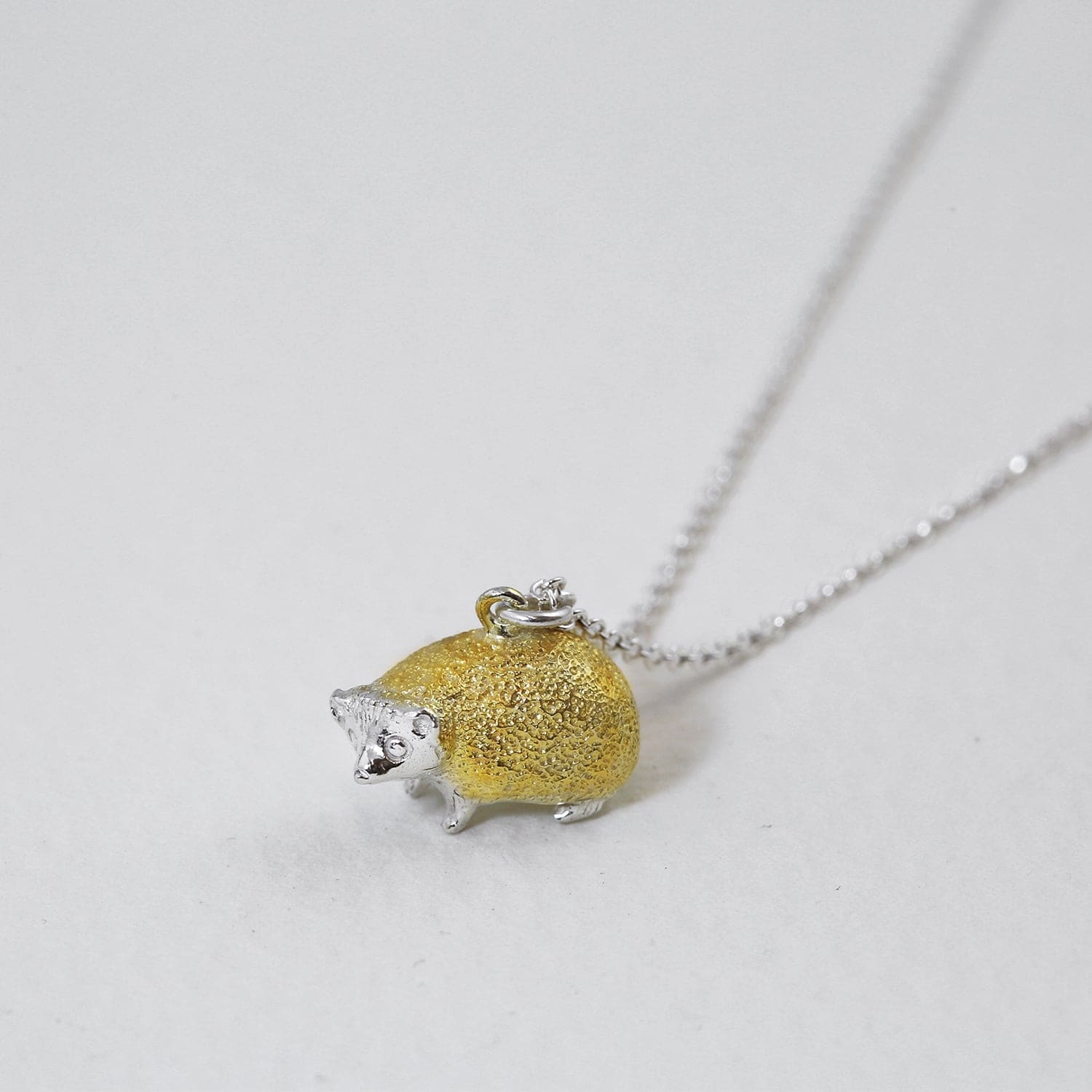 alex monroe x friends of the earth hedgehog necklace mixed metal