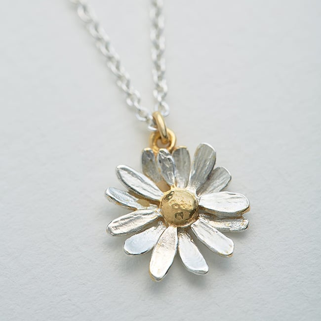 paper shot of mixed metal Daisy Necklace by Alex Monroe Jewellery