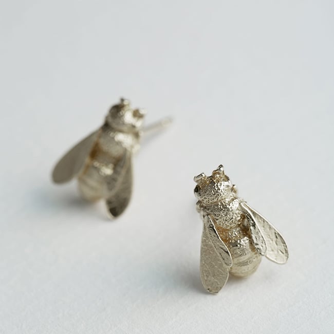 paper shot of silver Large Honey Bee Studs by Alex Monroe Jewellery