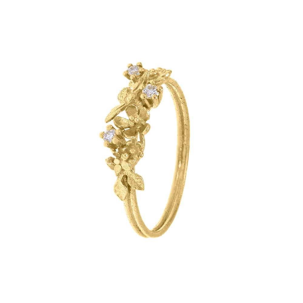 beekeeper twist ring with three diamonds