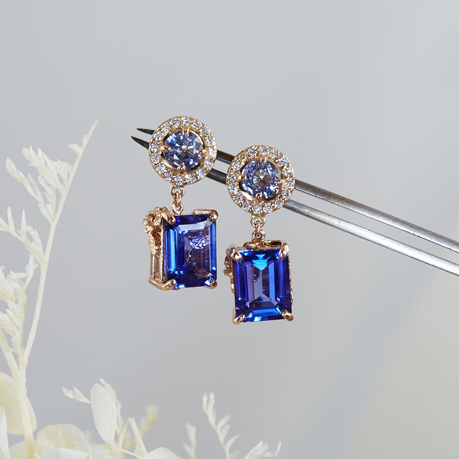 Bespoke commission of Tanzanite halo earrings by alex monroe