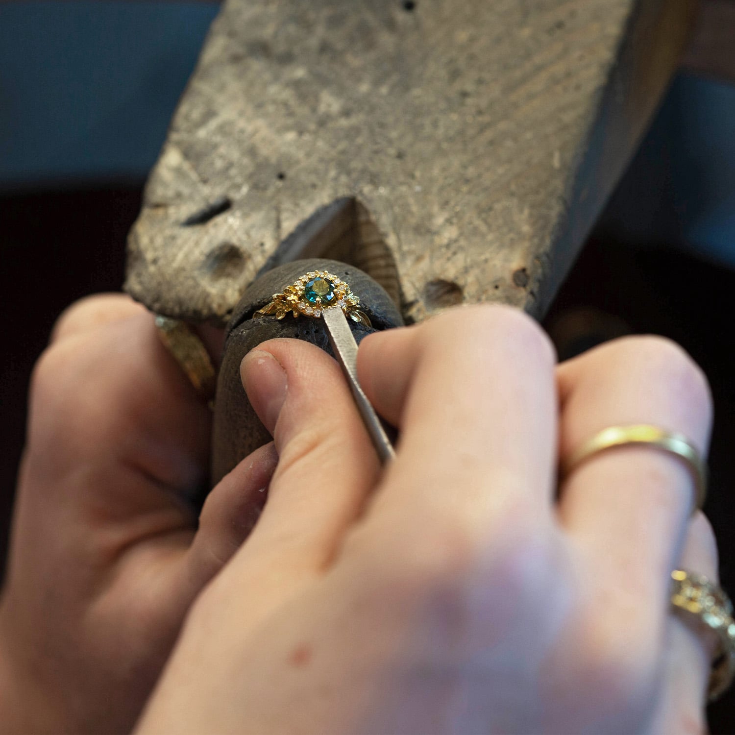 emerald diamond ring being worked in alex monroes workshop