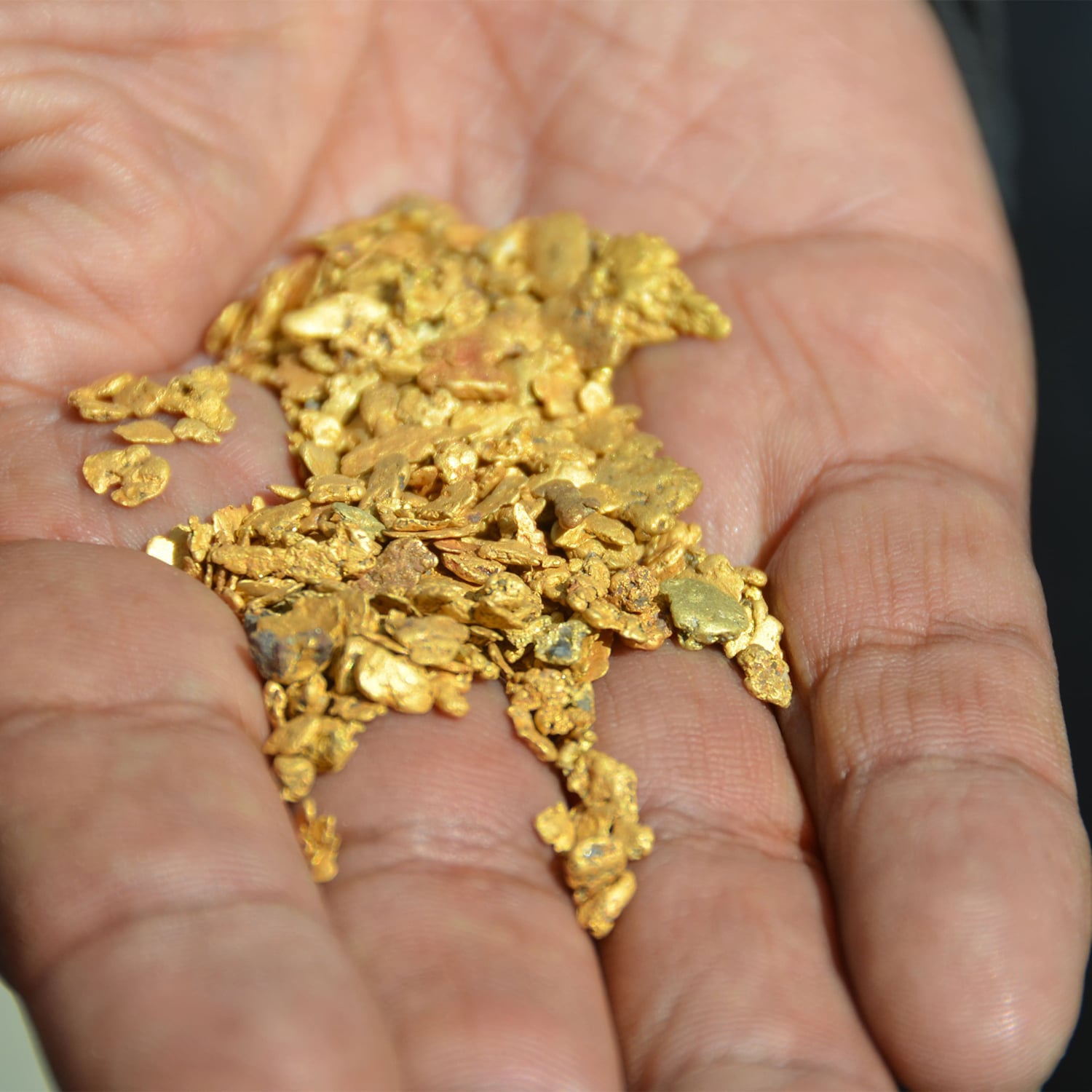  image of fairmined gold on hand