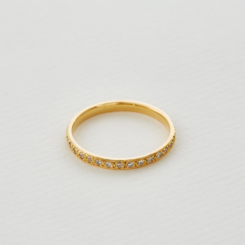 large spring eternity band in soild gold by alex monroe jewellery
